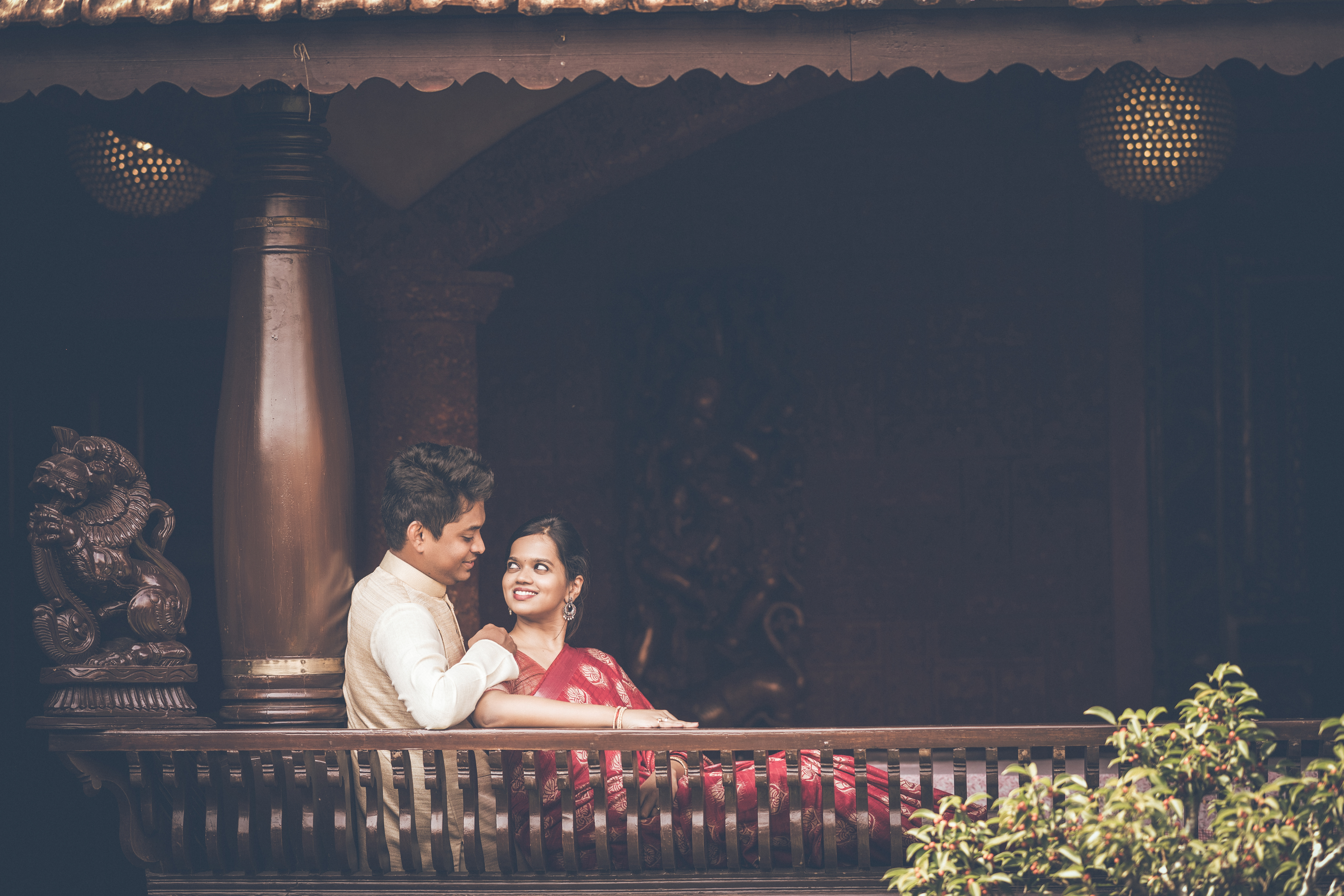 An intimate moment of the couple during the sandalwood application ritual